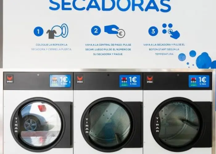 Sèche-linge de la Lavandería Azul d'El Fraile avec les instructions en trois étapes